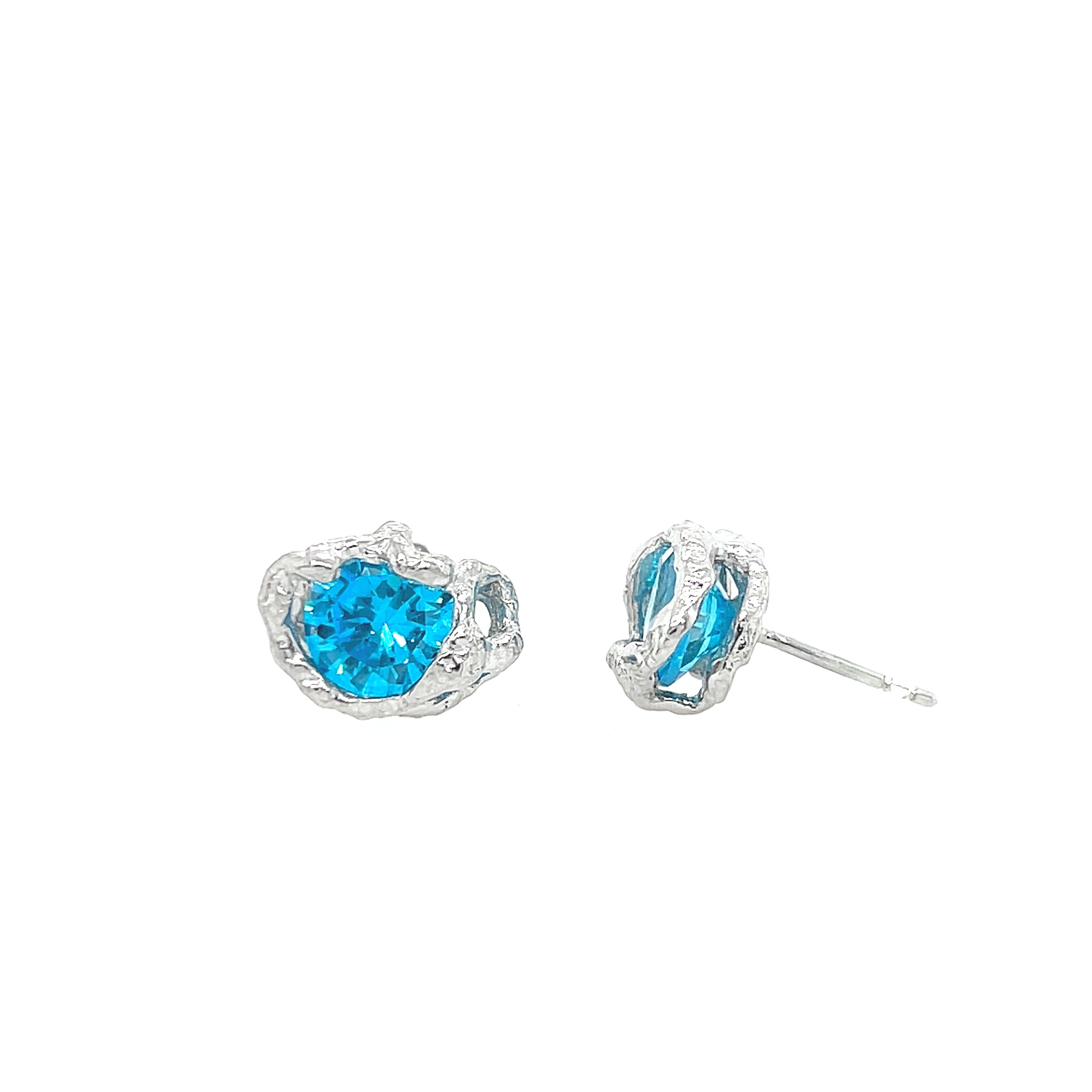 Silver earrings with blue zirconia stone