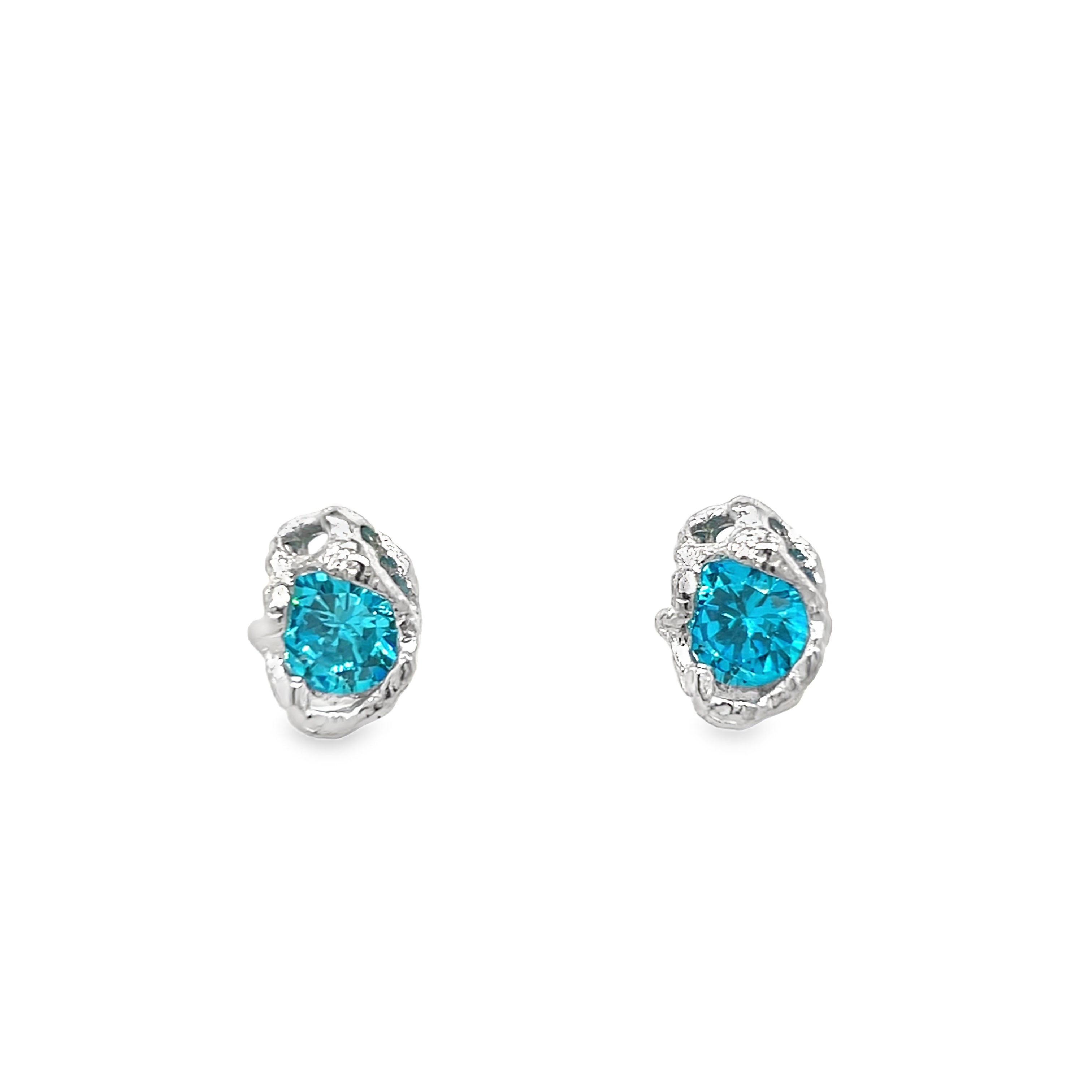 Silver earrings with blue zirconia stone
