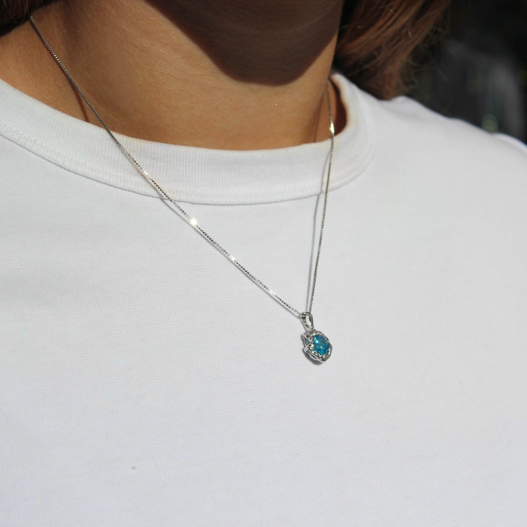 Silver necklace with blue zirconia stone - M